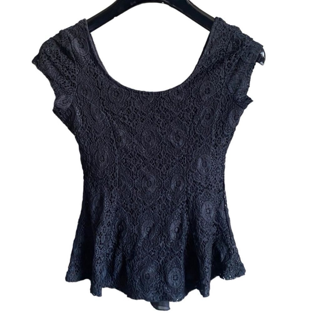 Woman’s Black Lace Overlay Peplum Style Top. Size XS